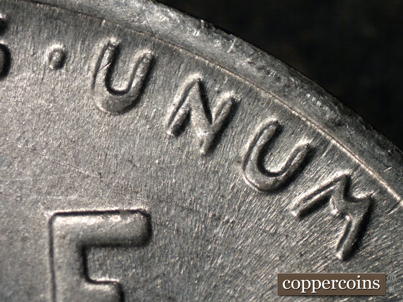 Die-stage B marker on 1943S•1DR•001 (1943 Doubled Die Reverse).