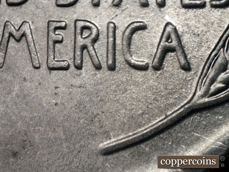 Die-stage B marker on 1943S•1DR•001 (1943 Doubled Die Reverse).