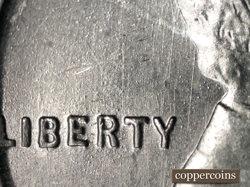 Die-stage B marker on 1943S•1DR•001 (1943 Doubled Die Reverse).