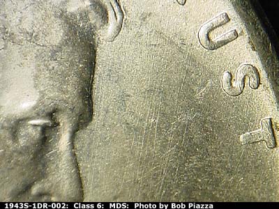 Die-stage B marker on 1943S•1DR•002 (1943 Doubled Die Reverse).