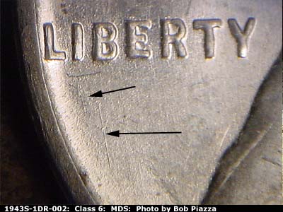 Die-stage B marker on 1943S•1DR•002 (1943 Doubled Die Reverse).