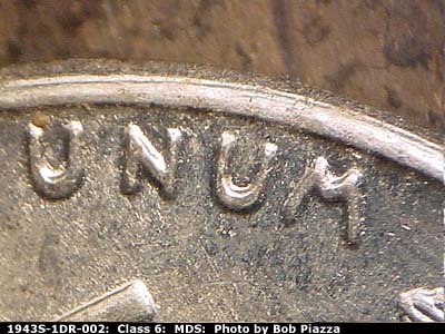 Die-stage B marker on 1943S•1DR•002 (1943 Doubled Die Reverse).