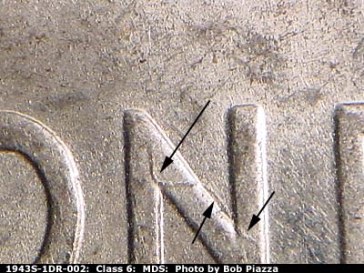 Die-stage B marker on 1943S•1DR•002 (1943 Doubled Die Reverse).
