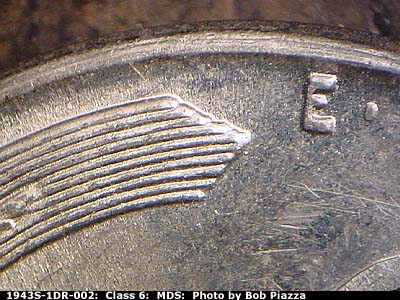 Die-stage B marker on 1943S•1DR•002 (1943 Doubled Die Reverse).