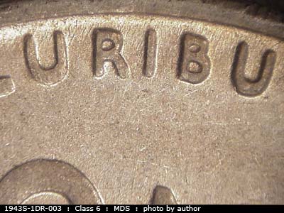 Die-stage B marker on 1943S•1DR•003 (1943 Doubled Die Reverse).