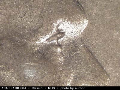 Die-stage B marker on 1943S•1DR•003 (1943 Doubled Die Reverse).