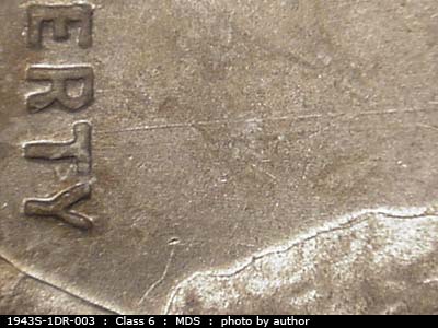 Die-stage B marker on 1943S•1DR•003 (1943 Doubled Die Reverse).