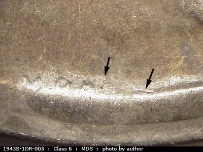 Die-stage B marker on 1943S•1DR•003 (1943 Doubled Die Reverse).