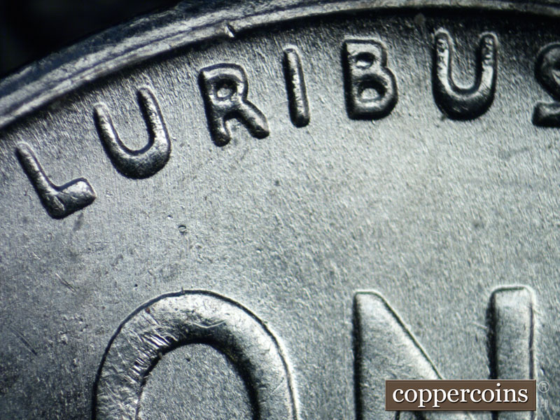 Die-stage B marker on 1943S•1DR•004 (1943 Doubled Die Reverse).