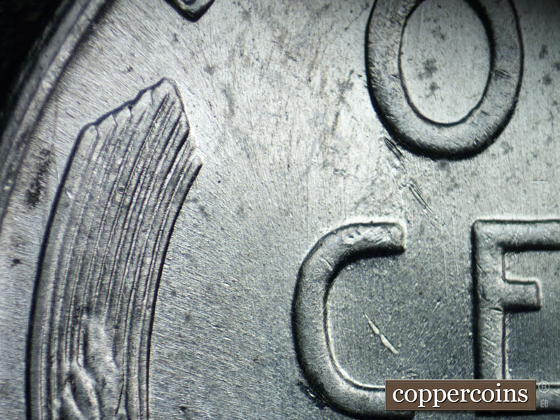 Die-stage B marker on 1943S•1DR•004 (1943 Doubled Die Reverse).