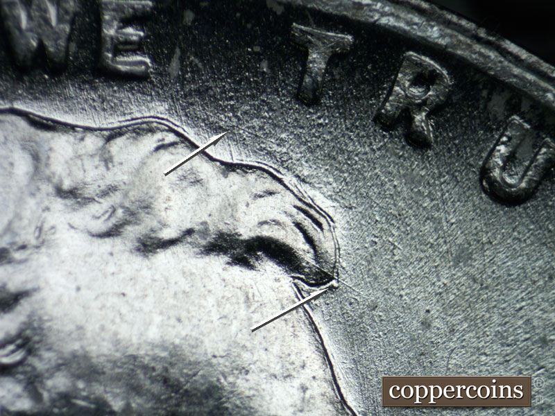 Die-stage B marker on 1943S•1DR•004 (1943 Doubled Die Reverse).