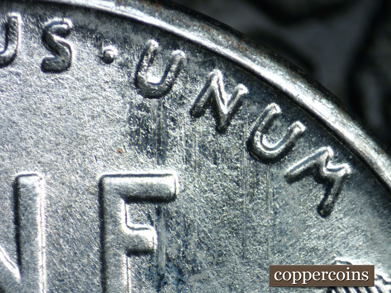 Die-stage B marker on 1943S•1DR•005 (1943 Doubled Die Reverse).