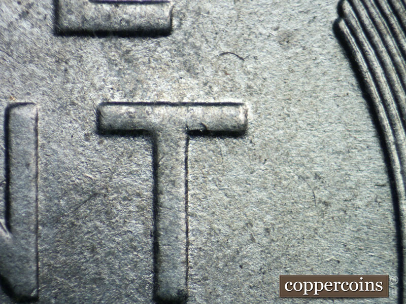 Die-stage B marker on 1943S•1DR•005 (1943 Doubled Die Reverse).