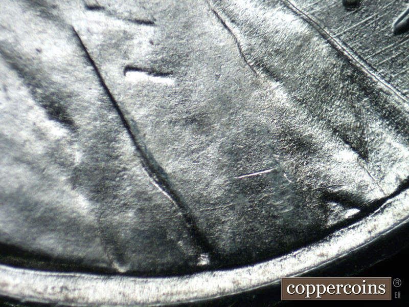 Die-stage B marker on 1943S•1DR•005 (1943 Doubled Die Reverse).