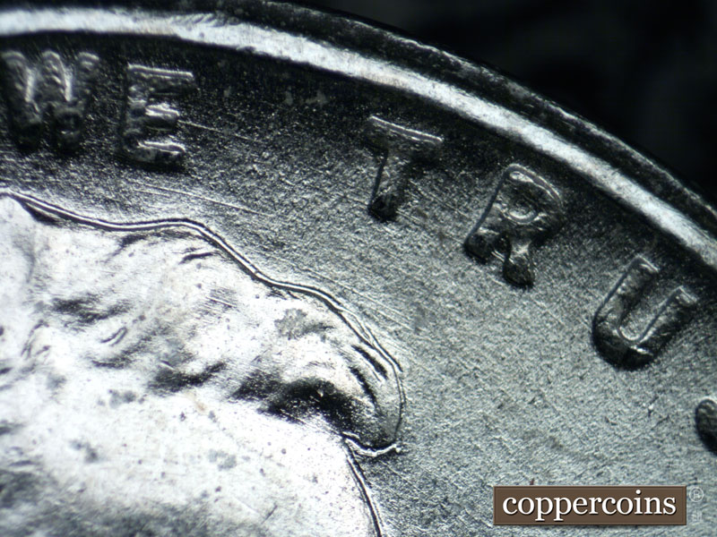 Die-stage B marker on 1943S•1DR•005 (1943 Doubled Die Reverse).