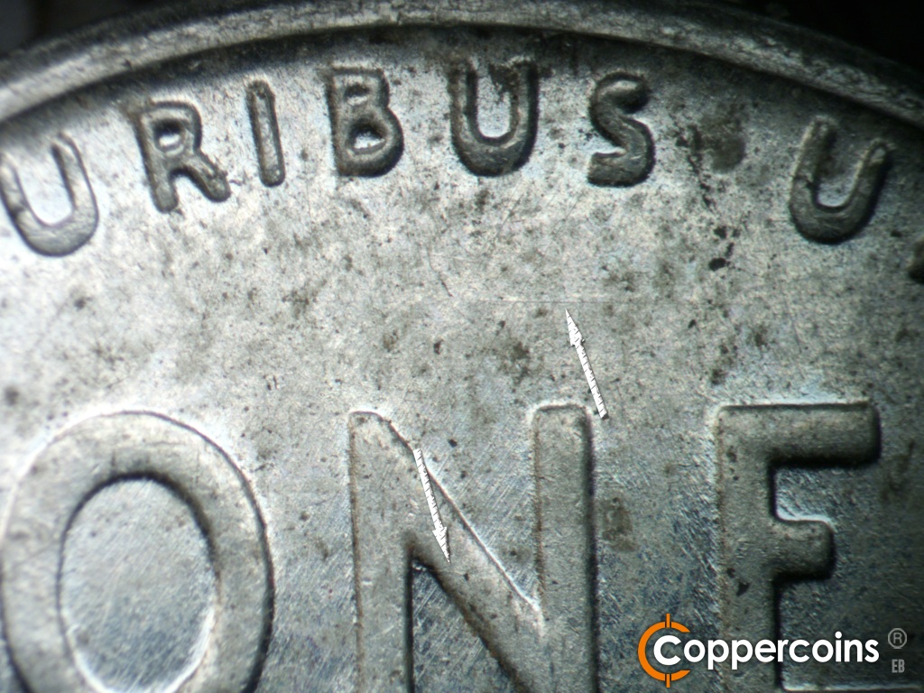 Die-stage A marker on 1943S•1DR•006 showing Die crack on N in ONE. E/W die scratch in field under US in PLURIBUS SW die scratches through N in ONE.