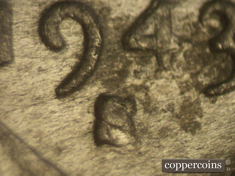 Die-stage C marker on 1943S•1MM•002 (1943 Repunched Mint Mark).
