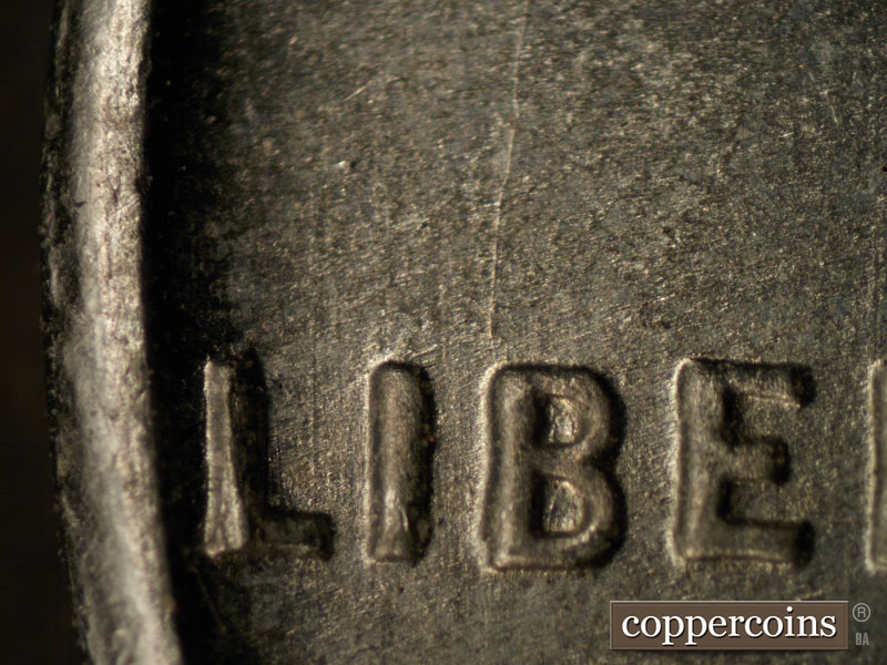 Die-stage B marker on 1943S•1MM•013 (1943 Repunched Mint Mark).