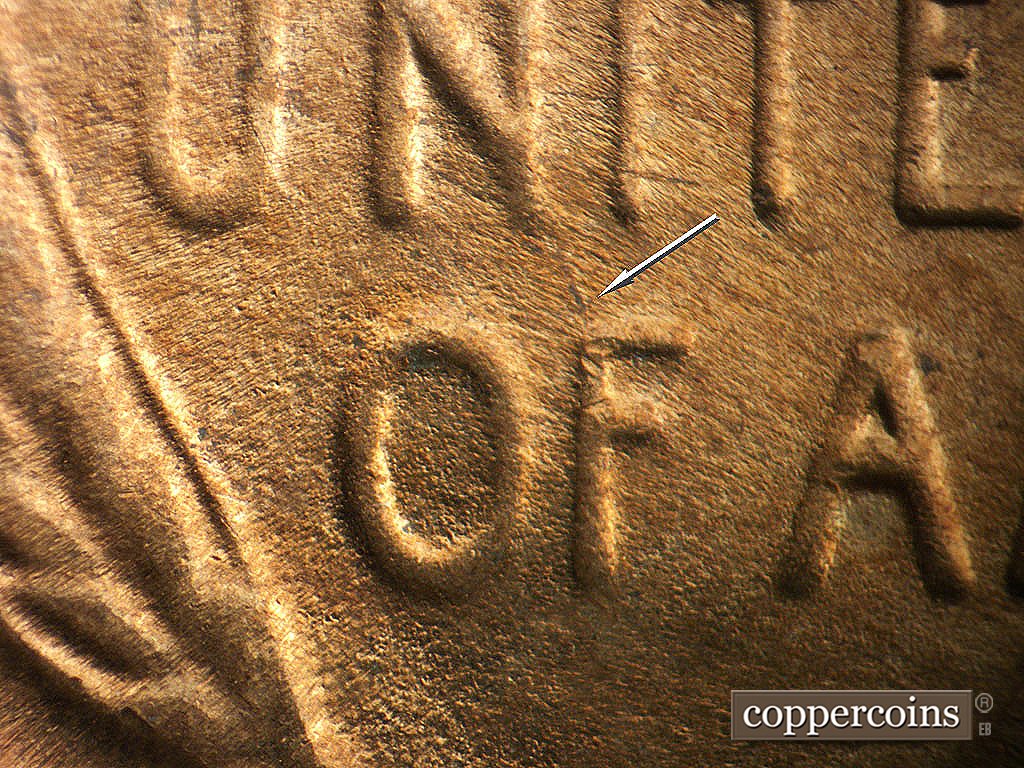 Die-stage C marker on 1944D•1DO•001 showing Die crack from top of F in OF.
