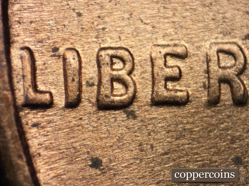 Die-stage C marker on 1944D•1DO•004 (1944 Doubled Die Obverse).