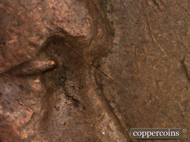 Die-stage C marker on 1944D•1DR•001 (1944 Doubled Die Reverse).