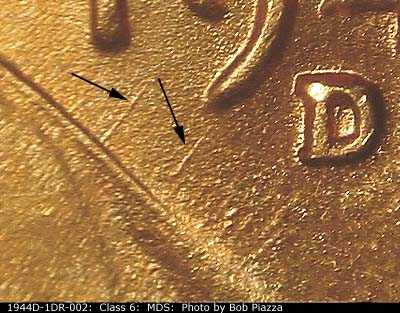 Die-stage B marker on 1944D•1DR•002 (1944 Doubled Die Reverse).