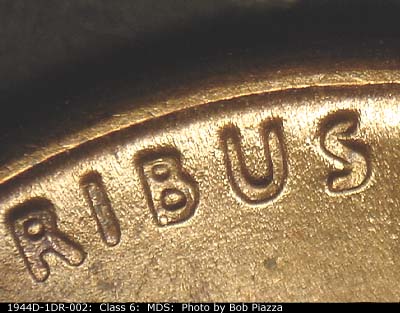 Die-stage B marker on 1944D•1DR•002 (1944 Doubled Die Reverse).
