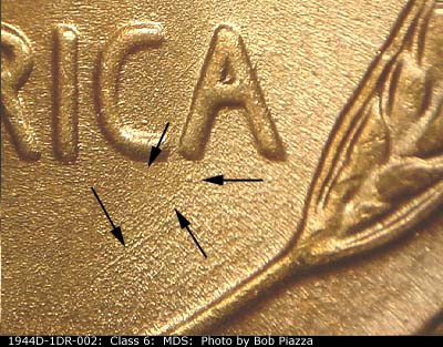 Die-stage B marker on 1944D•1DR•002 (1944 Doubled Die Reverse).