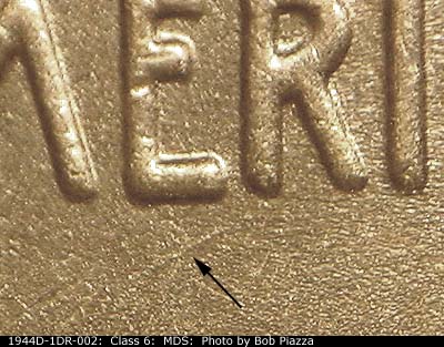 Die-stage B marker on 1944D•1DR•002 (1944 Doubled Die Reverse).