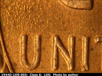 Die-stage C marker on 1944D•1DR•003 (1944 Doubled Die Reverse).