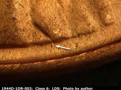 Die-stage C marker on 1944D•1DR•003 (1944 Doubled Die Reverse).