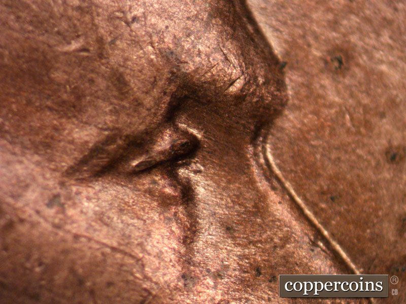 Die-stage B marker on 1944D•1MM•001 (1944 Repunched Mint Mark).