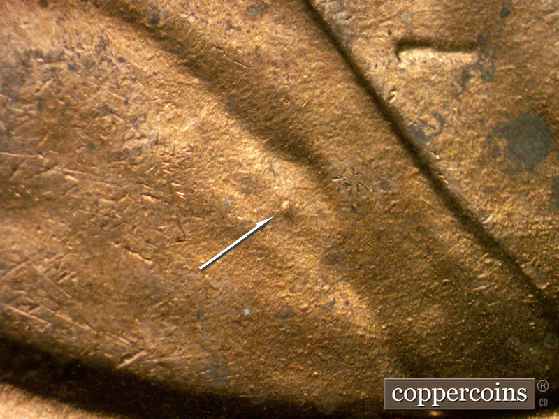 Die-stage B marker on 1944D•1MM•002 (1944 Repunched Mint Mark).