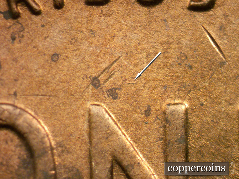 Die-stage B marker on 1944D•1MM•002 (1944 Repunched Mint Mark).