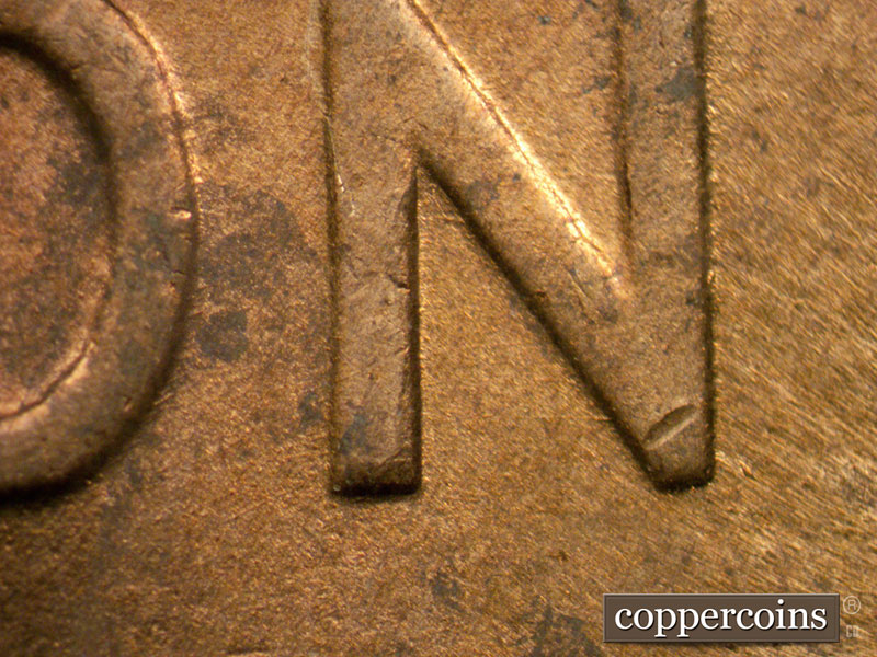 Die-stage B marker on 1944D•1MM•002 (1944 Repunched Mint Mark).