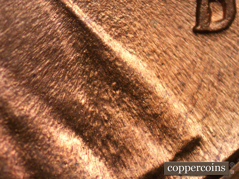 Die-stage C marker on 1944D•1MM•005 (1944 Repunched Mint Mark).