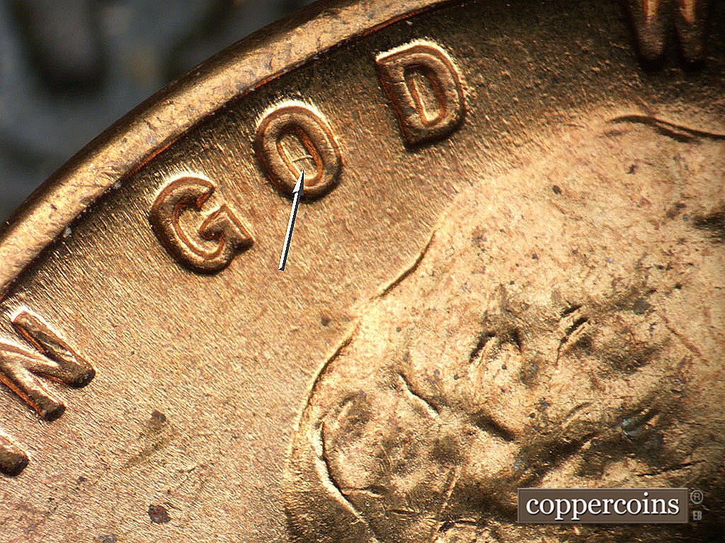 Die-stage B marker on 1944D•1MM•014 showing A die scratch shows inside the O of GOD.