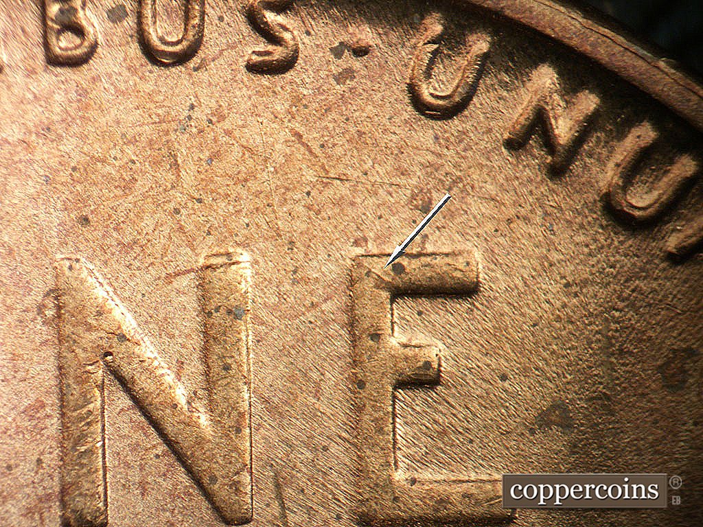 Die-stage B marker on 1944D•1MM•014 showing Die crack on upper corner of E in ONE.