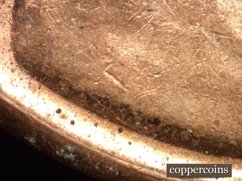 Die-stage B marker on 1944D•1MM•019 (1944 Repunched Mint Mark).