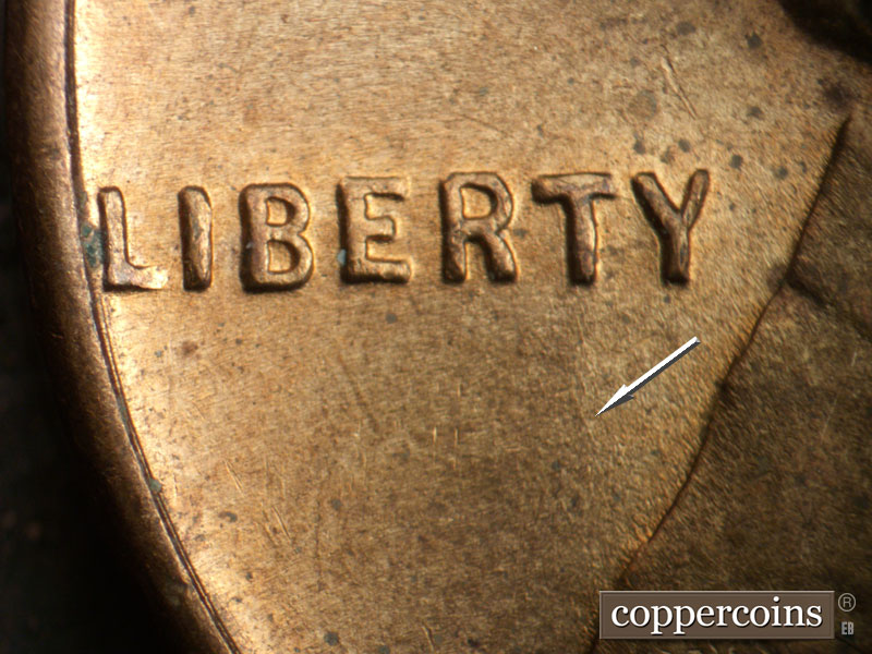 Die-stage B marker on 1944D•1MM•023 (1944 Repunched Mint Mark).