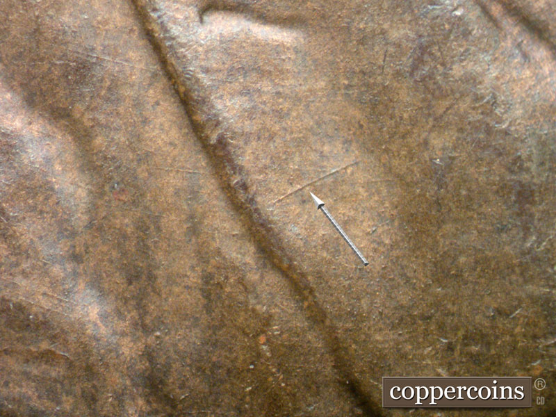 Die-stage B marker on 1944D•1OM•001 (1944 Over Mint Mark).