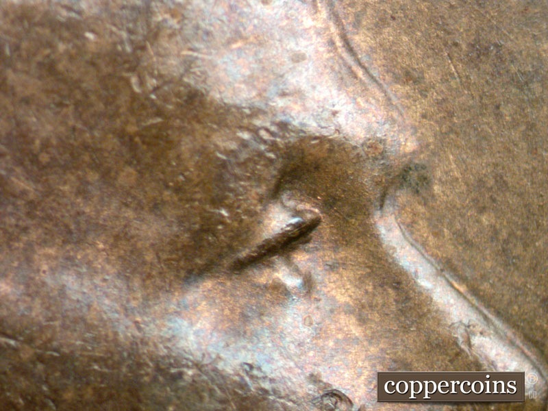 Die-stage B marker on 1944D•1OM•001 (1944 Over Mint Mark).