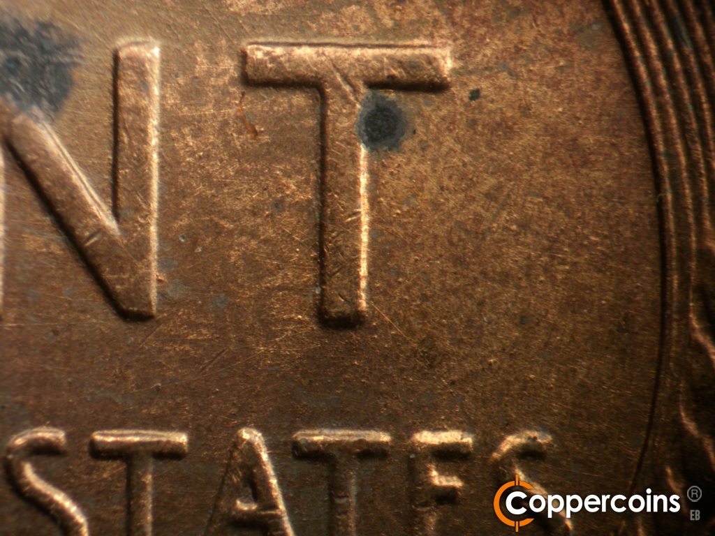 Die-stage B marker on 1944D•1OM•002 showing No die chip on the lower T in CENT.