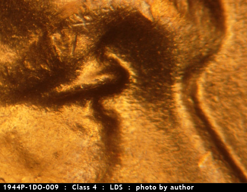 Die-stage C marker on 1944P•1DO•009 (1944 Doubled Die Obverse).