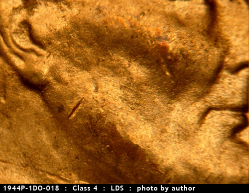 Die-stage C marker on 1944P•1DO•018 (1944 Doubled Die Obverse).