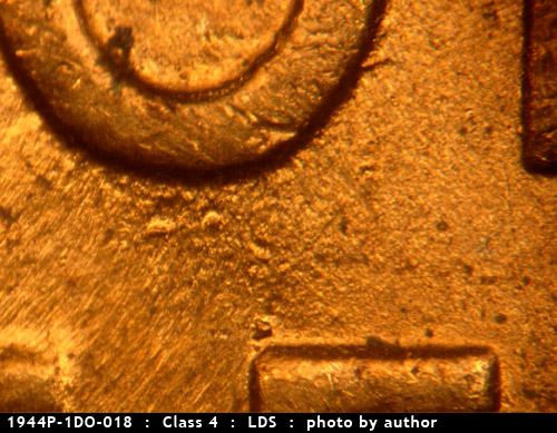 Die-stage C marker on 1944P•1DO•018 (1944 Doubled Die Obverse).