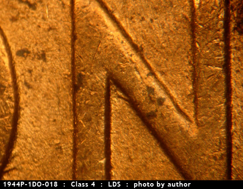 Die-stage C marker on 1944P•1DO•018 (1944 Doubled Die Obverse).
