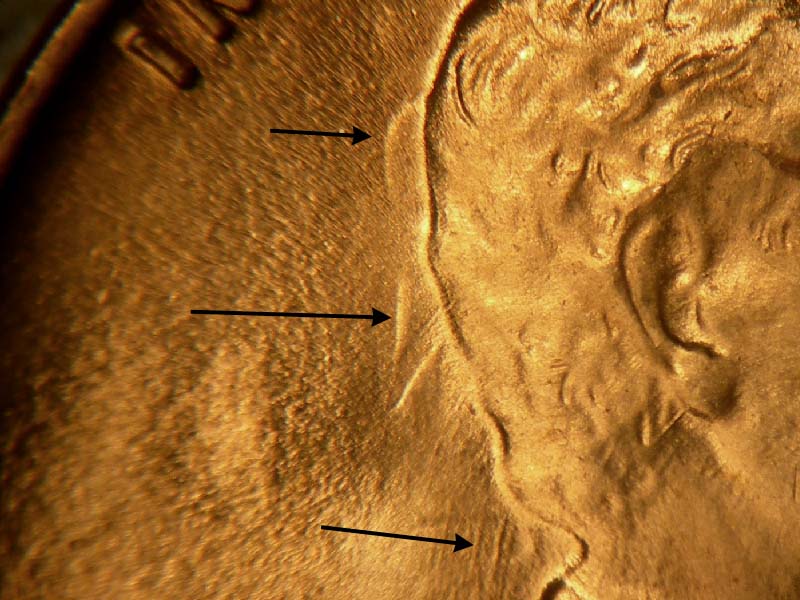 Die-stage C marker on 1944P•1DO•024 (1944 Doubled Die Obverse).