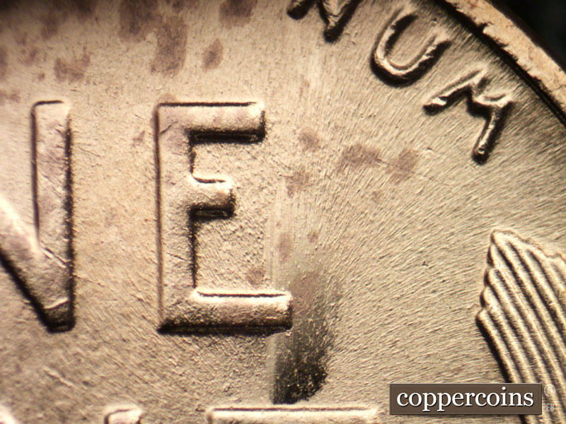 Die-stage B marker on 1944P•1DO•032 (1944 Doubled Die Obverse).