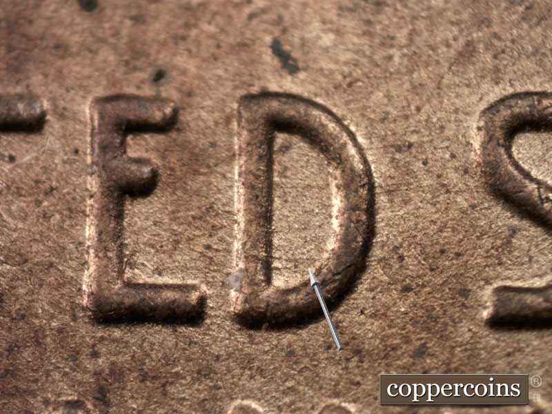 Die-stage C marker on 1944P•1DR•002 (1944 Doubled Die Reverse).